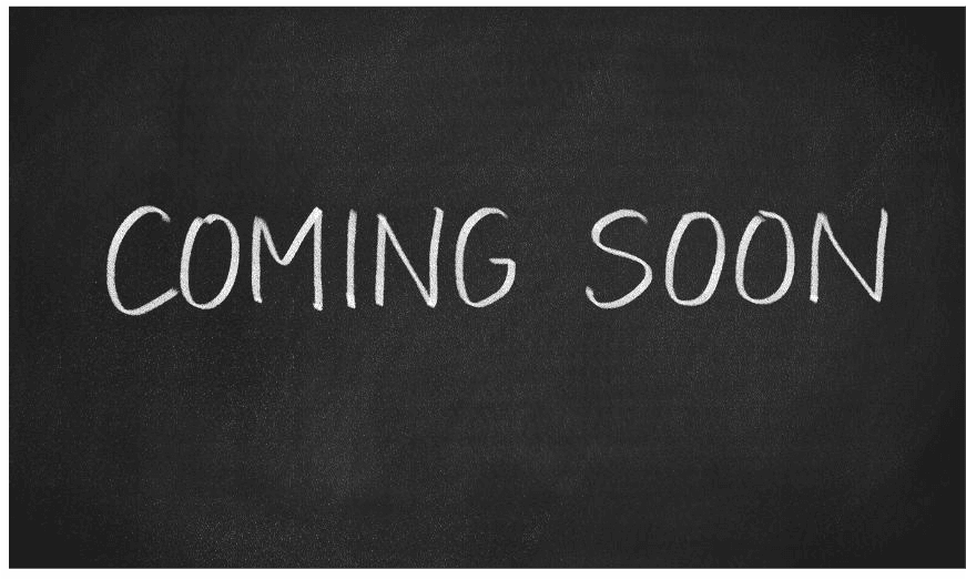 Dark chalkboard-like background with words 'COMING SOON' written prominently in white chalk-style font